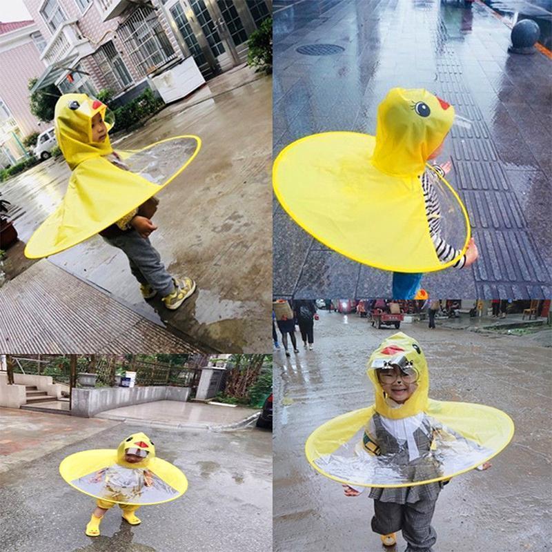 Kleine gelbe Ente UFO-Regenmantel